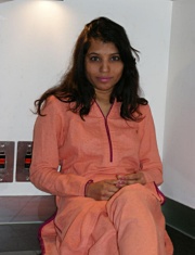 Pic gal 011 Kavya in her kitchen in shalwar suits cooking. 